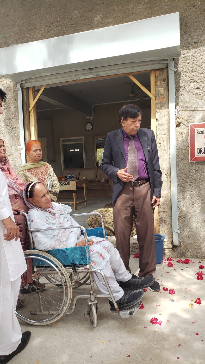 Dr. Bhagwandas Pathai shares sweets with guests